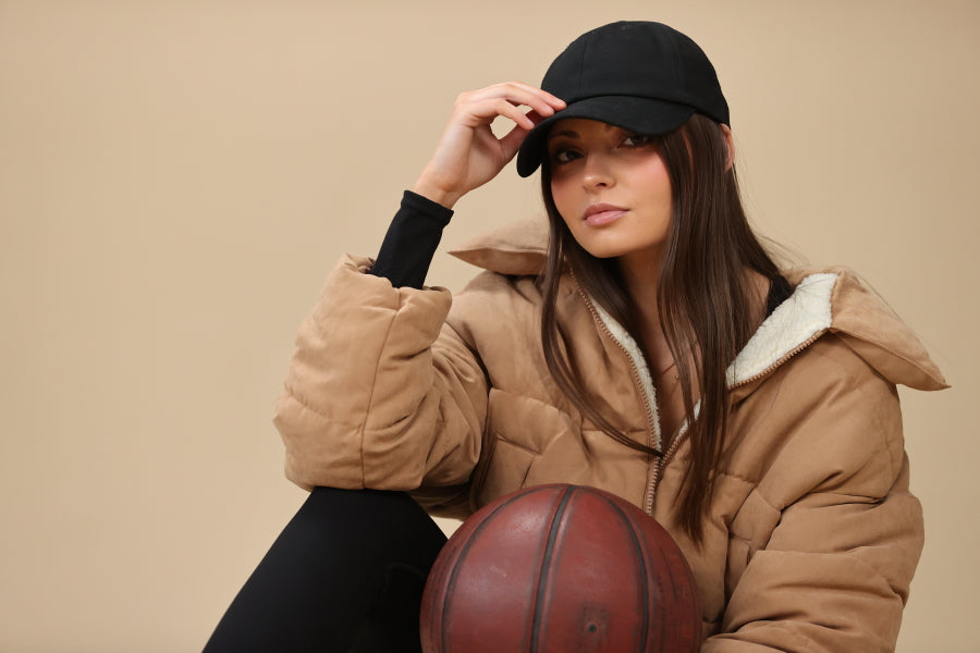 Woman wearing a better-fitting baseball cap designed for small heads and feminine-fit sizing