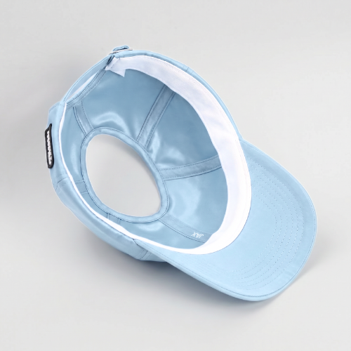 Interior view of the baby blue Rosebloom JAX hat, showing its smooth satin lining and PETAL crown-height opening.