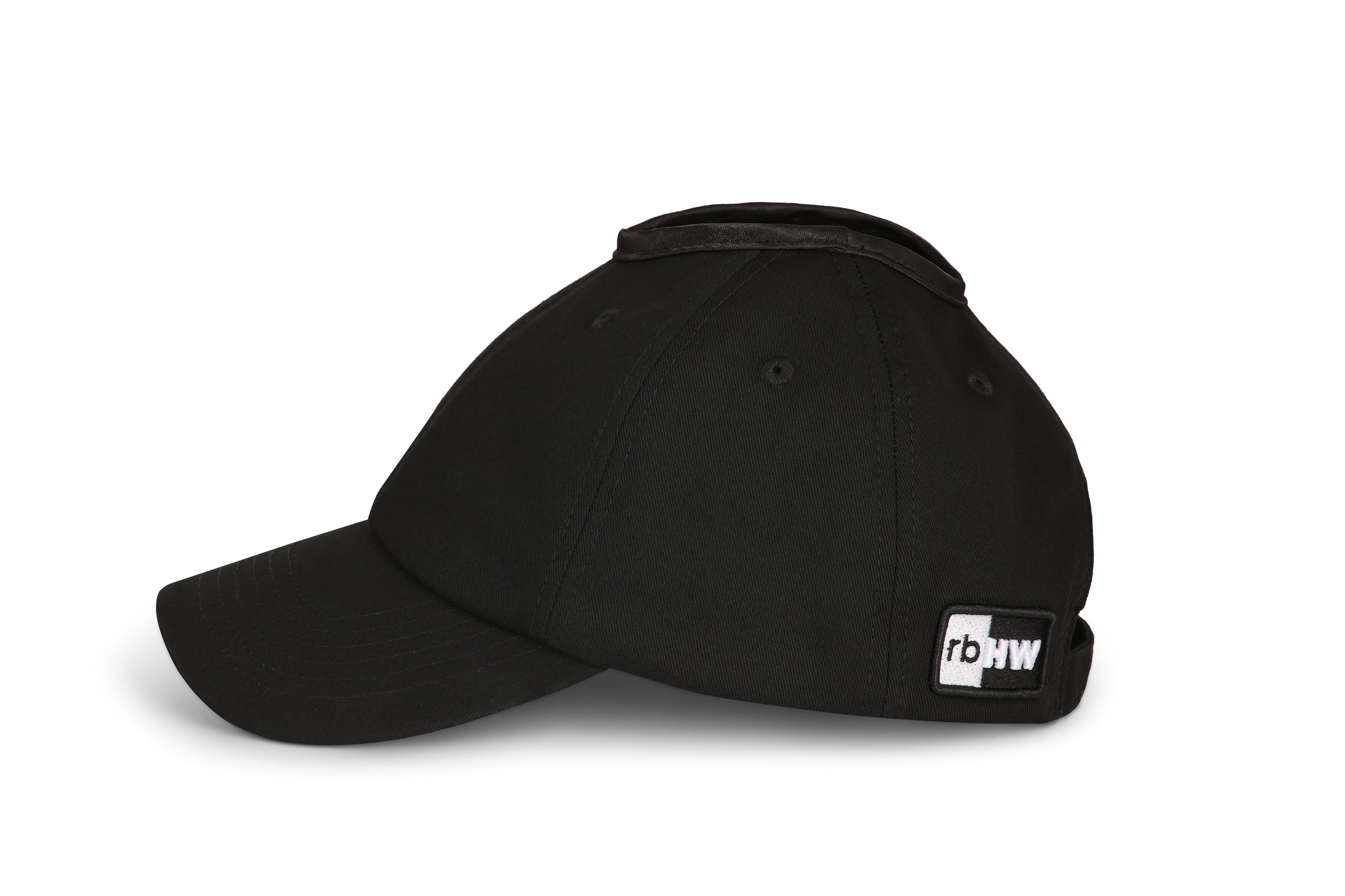 Side view of black Rosebloom PNT ponytail hat with Rosebloom logo patch
