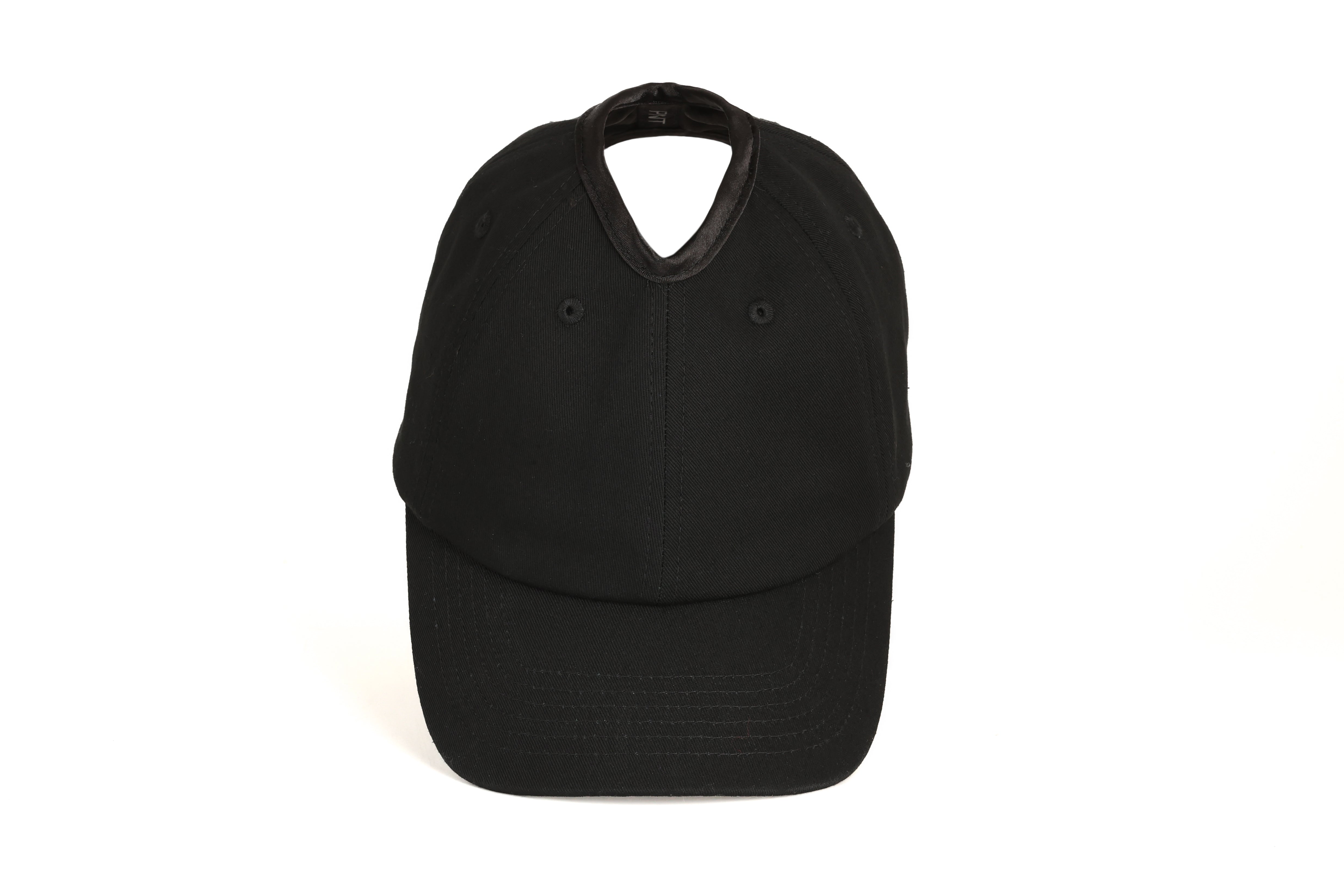 Rear view of black Rosebloom PNT ponytail hat highlighting the crown opening

