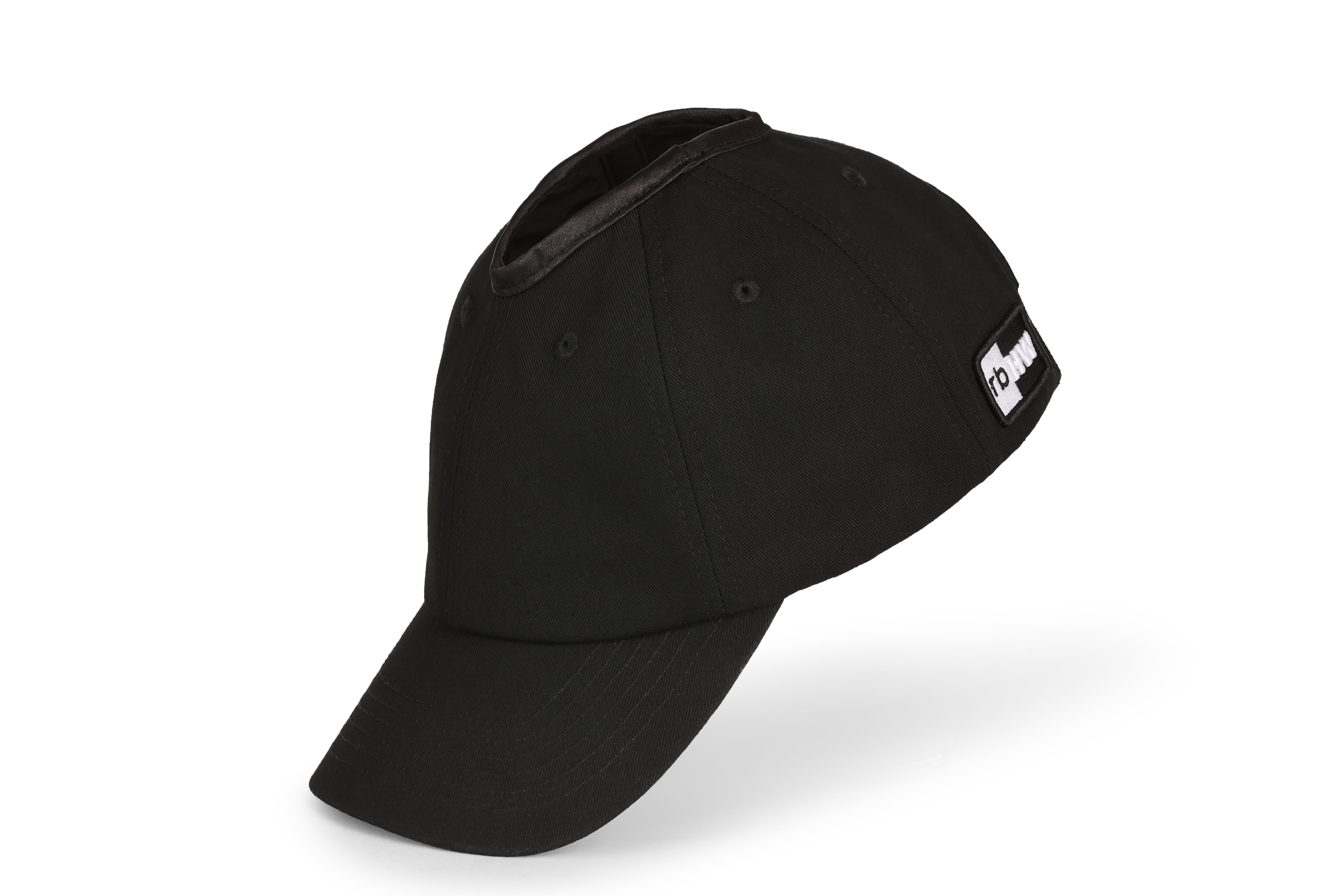 Side angle view of black Rosebloom PNT ponytail hat
