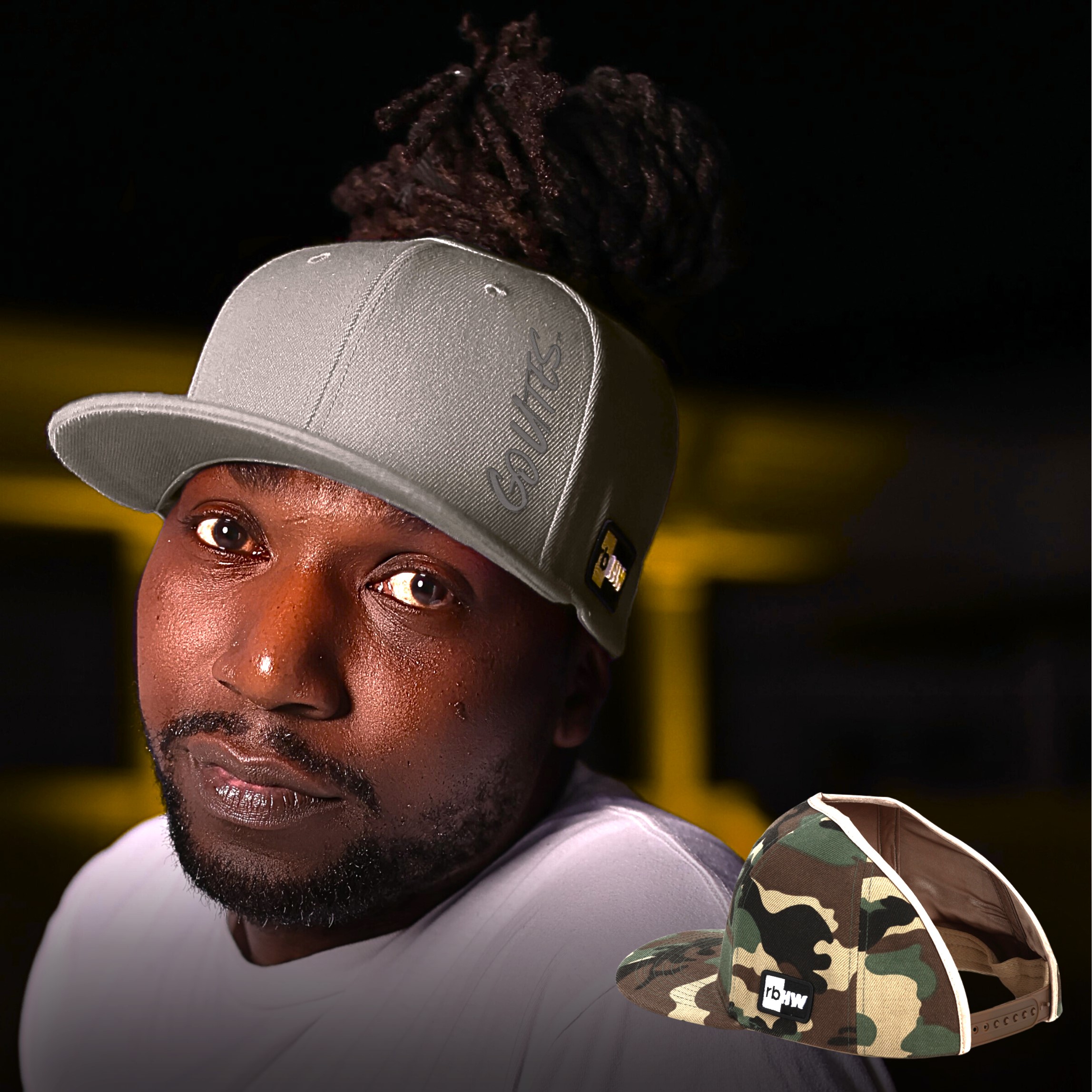 University of Utah hat for thick hair Black man with locs wears satin lined University of Utah flat bill snap back for thick hair hat