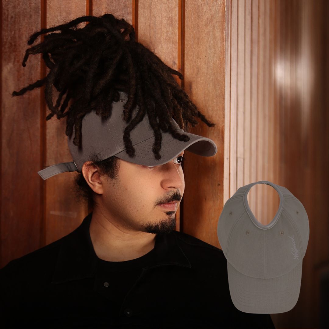 NC State Wolfpack satin lined high ponytail baseball hat for locs and textured hair Black man wears an NC State Wolfpack satin lined high ponytail baseball hat for locs and textured hair