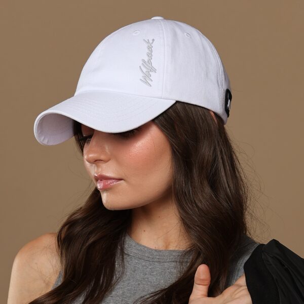 woman wearing NC State Wolfpack satin lined hat for women
